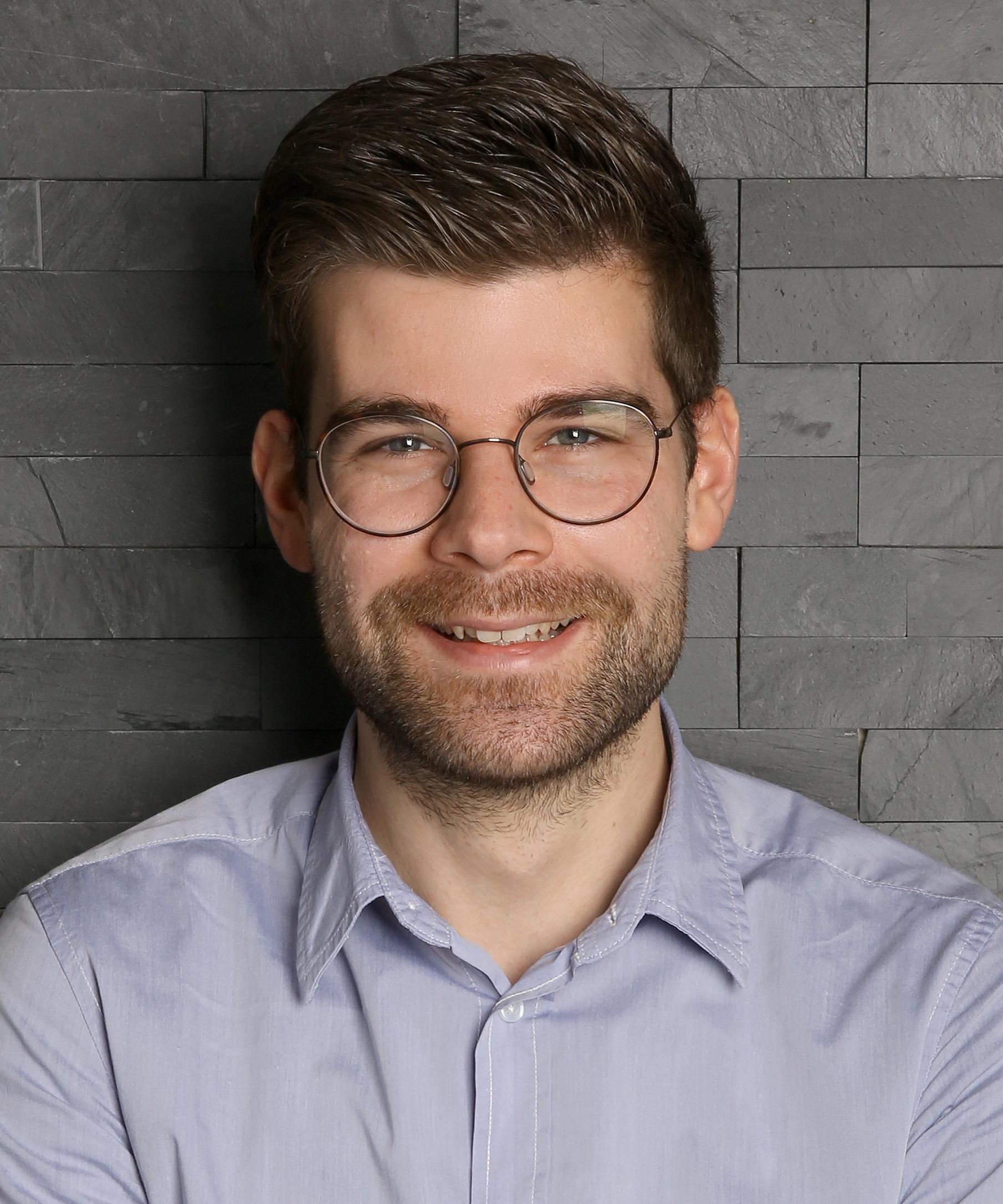 Dr. Andrin Büchler